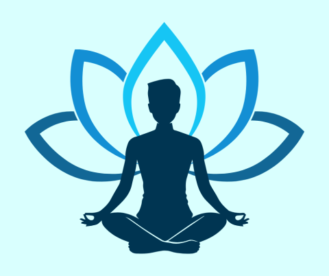 Silhouette of person in meditative pose with lotus flower in background